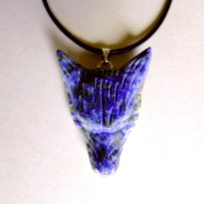 CARVED WOLF'S HEAD PENDANT IN LAPIS LAZULI ON WAXED CORD.   SP13949PEND