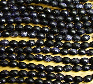 BLUE GOLD STONE RICE BEADS ON A STRING. SPR6030