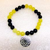 Mandala Charm Power Bead Bracelet with orange Calcite & Black Obsidian Beads.   SPR15249BR