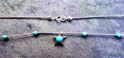 925 SILVER NECKLACE WITH STAR SHAPE PENDANT. 942NT