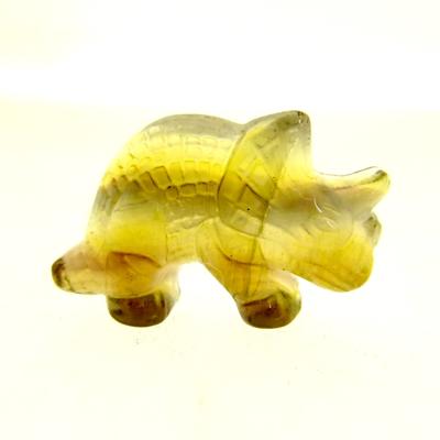 RELIEF CARVING OF A TRICERATOPS IN YELLOW FLUORITE.   SP13895POL