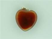 CARNELION HEART SHAPED PENDANT COMPLETE WITH SILVER BAIL. 32MM DROP INC BAIL X 25MM WIDE. 8g.