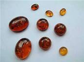 AMBER DOME POLISHED OVAL CABS.   BN6X8