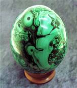 MALACHITE EGG WITH WOODEN DISPLAY STAND. SP8423POL
