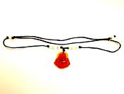 CARNELIAN BUDDHA PENDANT ON A BEADED AJUSTABLE CORD.   SPR13942PEND