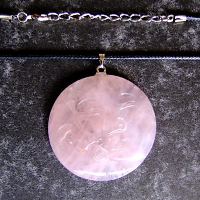 MAN IN THE MOON CARVED PENDANT IN ROSE QUARTZ ON WAXED CORD.   SPR13956PEND
