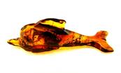 DOLPHIN CARVING IN BALTIC AMBER. SP8817