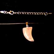 TUSK/ HORN SHAPED PENDANT IN ROSE QUARTZ ON WAXED CORD.   SPR14696PEND