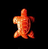 CARVING OF A TURTLE IN COPPER GOLDSTONE.   SP12235POL