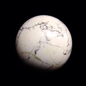 GEMSTONE SPHERE IN WHITE HOWLITE.   SP14652SLF