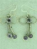 925 SILVER TIED BOW DESIGN EARRINGS FEATURING 3 FACECED AMETHYST CABS. SIZEOF CABS LARGE- 5MM DIA.