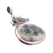 An original one off design pendant featuring an oval, dome polished piece of Orbicular Jasper.   SP17903PEND