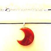 CRESCENT MOON PENDANT IN CARNELIAN ON WAXED CORD.   SPR13965PEND