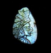 INDIAN CHIEF CARVING ON A LABRADORITE PEBBLE.   SP12096POL