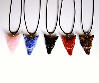 5 PACK CARVED WOLF'S HEAD PENDANTS ON WAXED CORD.    SPR13953PENDWH