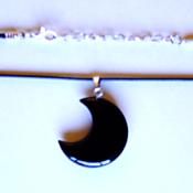 CRESCENT MOON PENDANT IN BLACK OBSIDIAN ON WAXED CORD.   SPR13968PEND