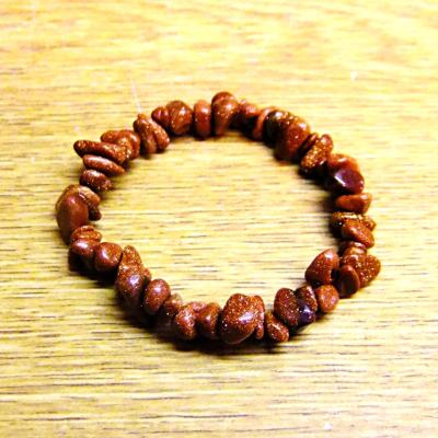 ELASTICATED COPPER GOLDSTONE CRYSTAL CHIP BRACELET.   SPR14292BR