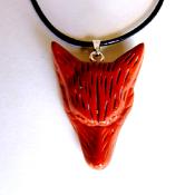CARVED WOLF'S HEAD PENDANT IN RED JASPER ON WAXED CORD.    SPR13951PEND