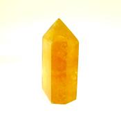 GEMSTONE POLISHED AND FACETED POINT IN DARK HONEY CALCITE.   SP13894POL