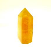GEMSTONE POLISHED AND FACETED POINT IN DARK HONEY CALCITE.   SP13894POL